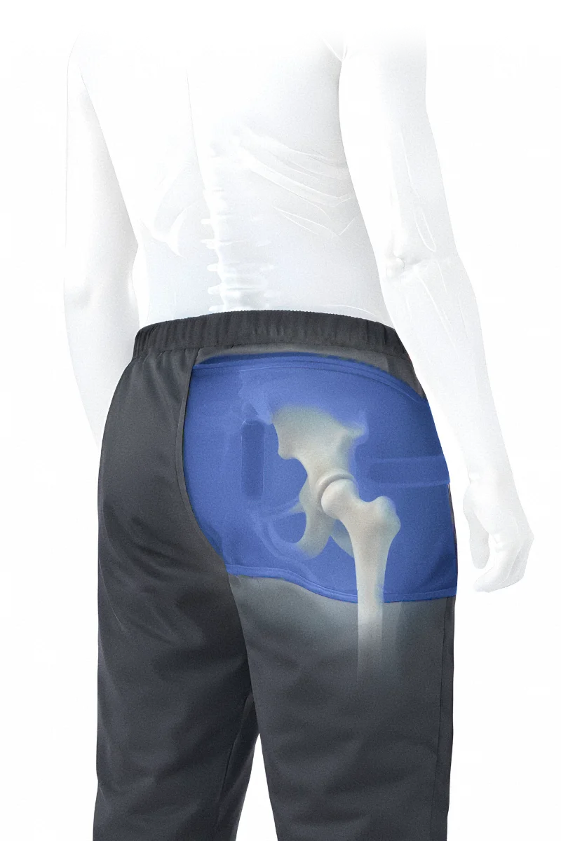 Transparent cutaway view showing the Air-Sequr device inside regular pants, protecting the hip joint